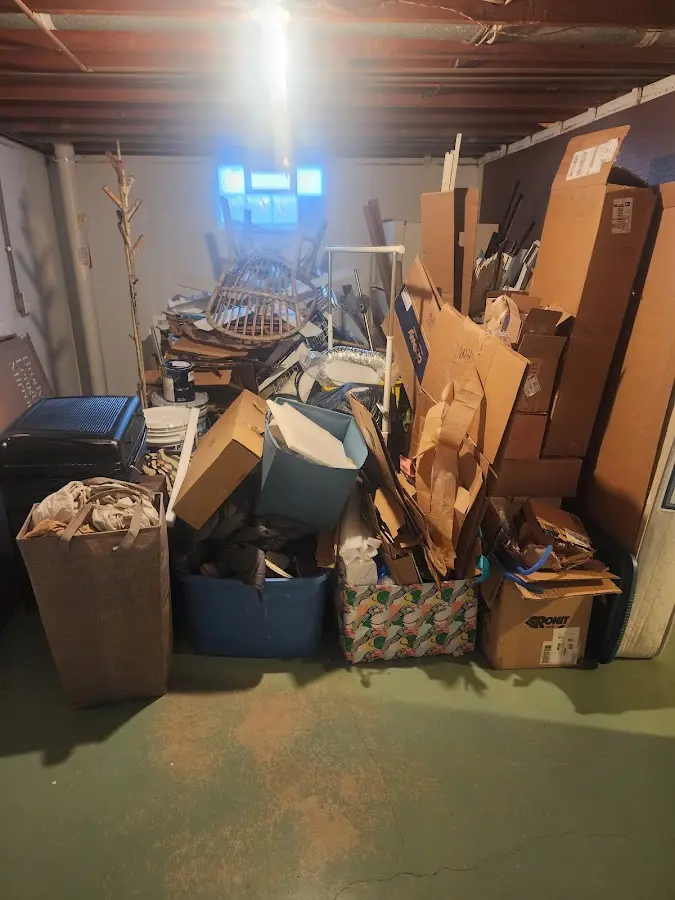 Roll-off dumpster container at job site for 20 Yard Dumpster Rental in Chilton